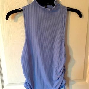 Blue tank top. Never been worn. Size large.